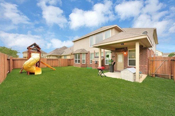 Spacious House equipped with Theatre room and Playset in yard for work and play