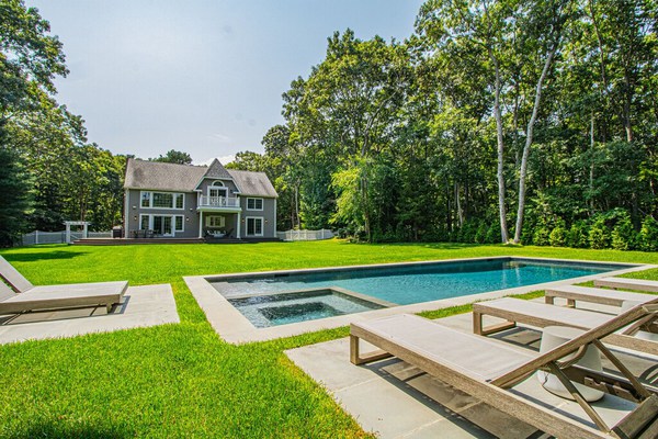 Private traditional Sagaponack home with stunning backyard, pool and spa.