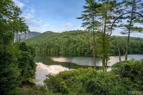 Stunning lakefront views directly on Fairfield Lake with dock and fishing boat!