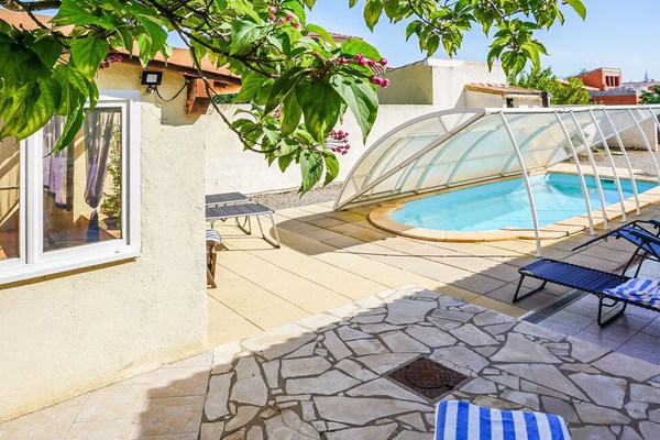 Amazing home in Paraza with Outdoor swimming pool and 3 Bedrooms