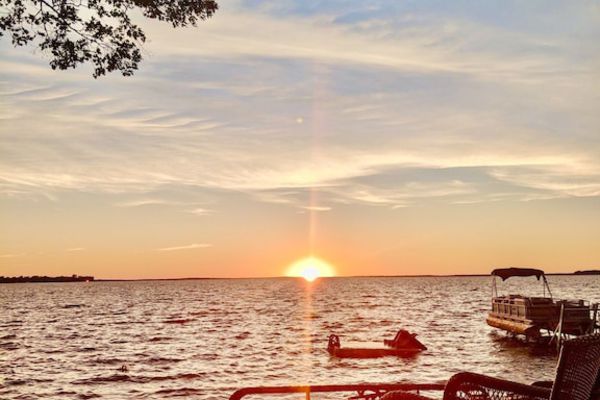 New Listing! Lake front cottage with 100' of private sandy beach
