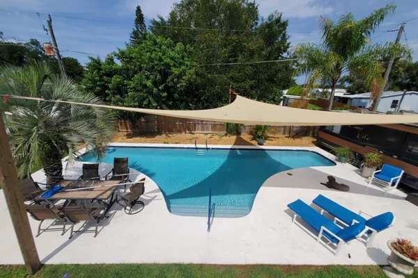Complete house 3 bed / 2 bath with tropical backyard, pool, fenced yard, hammock