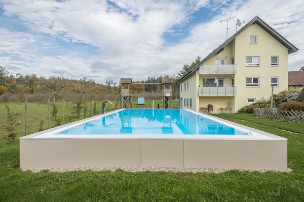 Well-Furnished Apartment “Pfingstrose” on Farm close to Lake Constance with Wi-Fi, Terrace, Garden & Pool; Parking Available